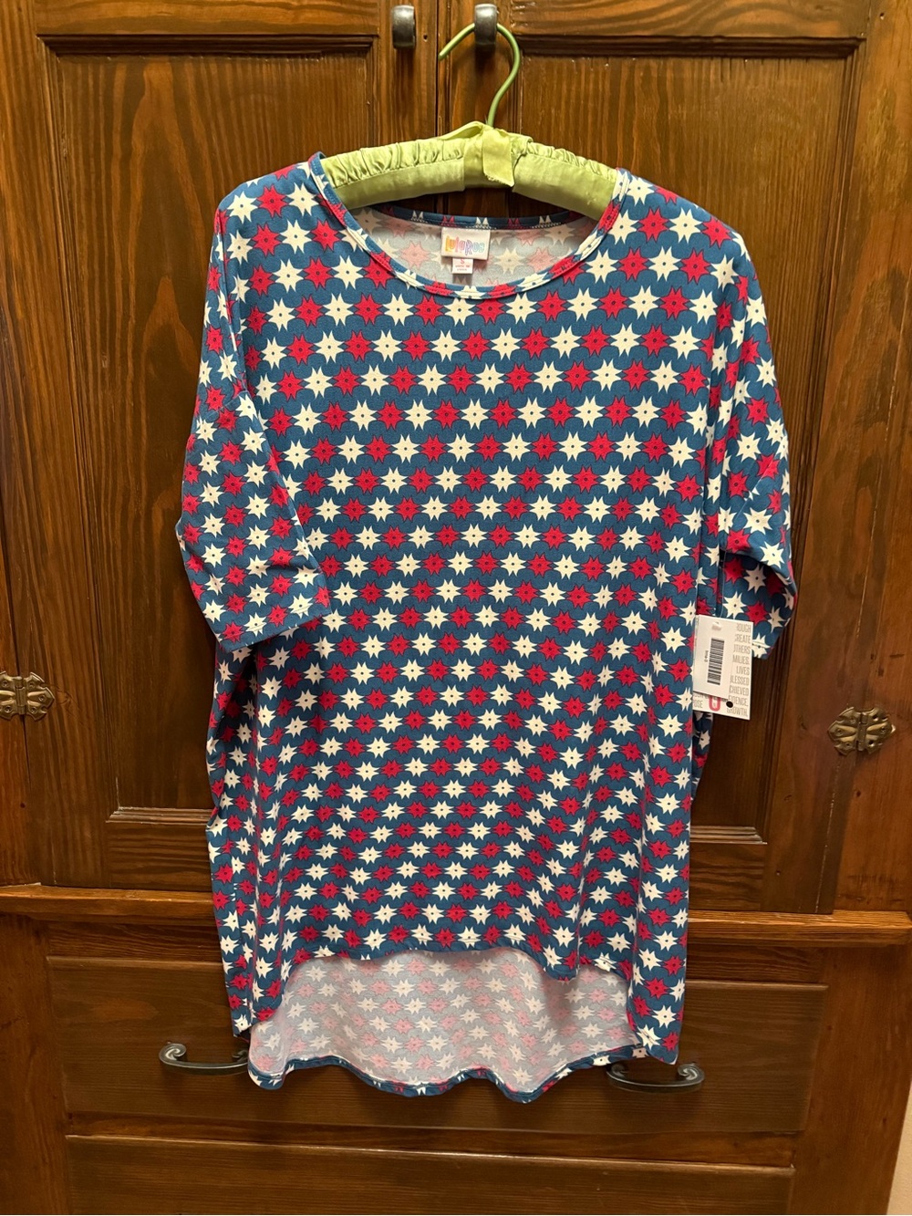LuLaRoe Teal Tunic with Red and Cream Starburst Print